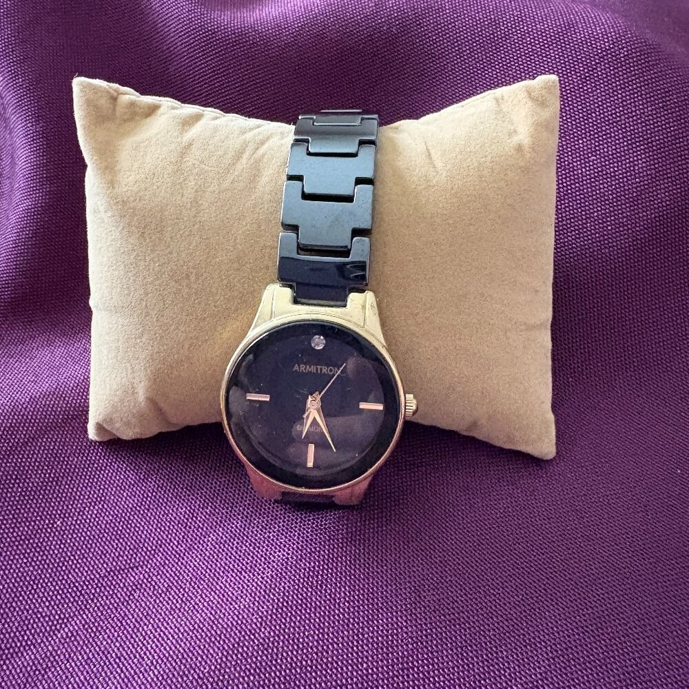 Armitron Women’s Quartz Watch – Black Dial, Two-Tone Bracelet (75/5348GP / Y121E